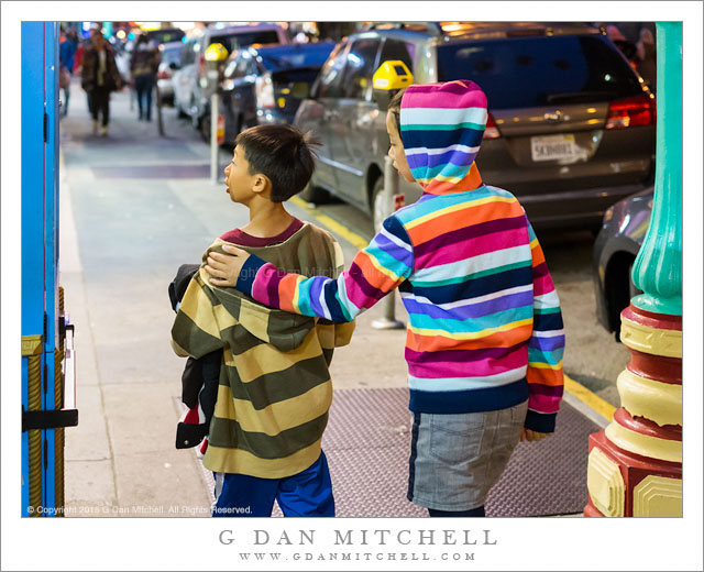 Children in Striped Hoodies