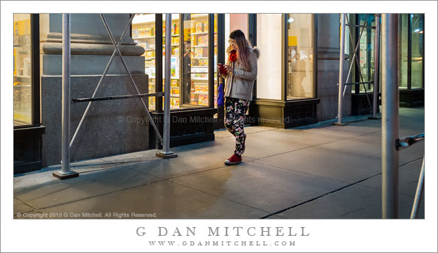 Woman Walking Past Scaffolding
