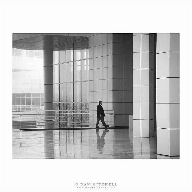 Man Walking, Rain - Getty Center