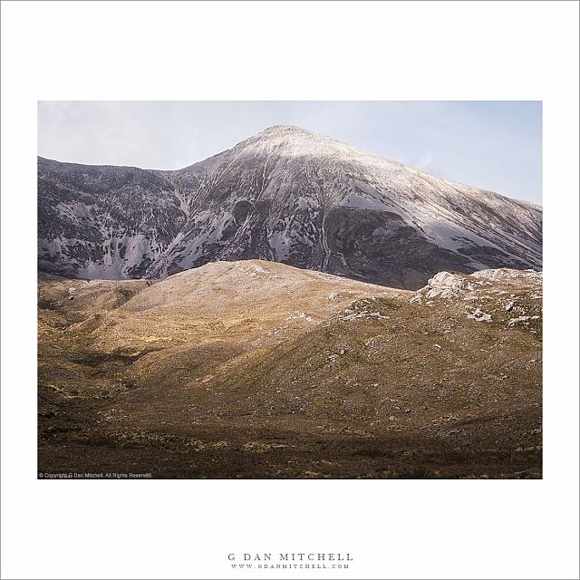 Snow-dusted Highlands Peak