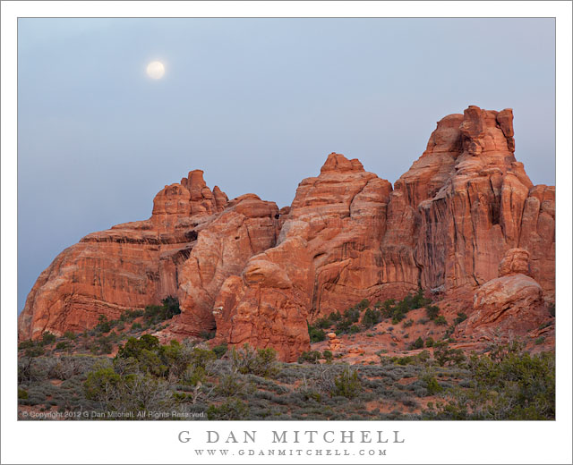 RedRockMoonRisesThruClouds20120405