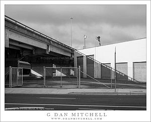 White Building, Overpass, Empty Lot