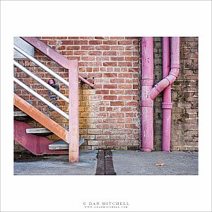 Brick Wall, Pipes, and Stairway