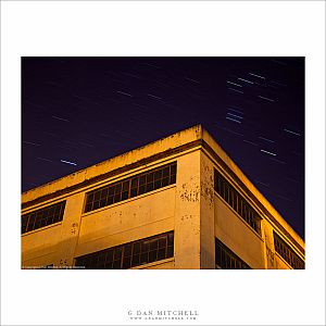 Yellow Building With Dark Windows, Star Trails